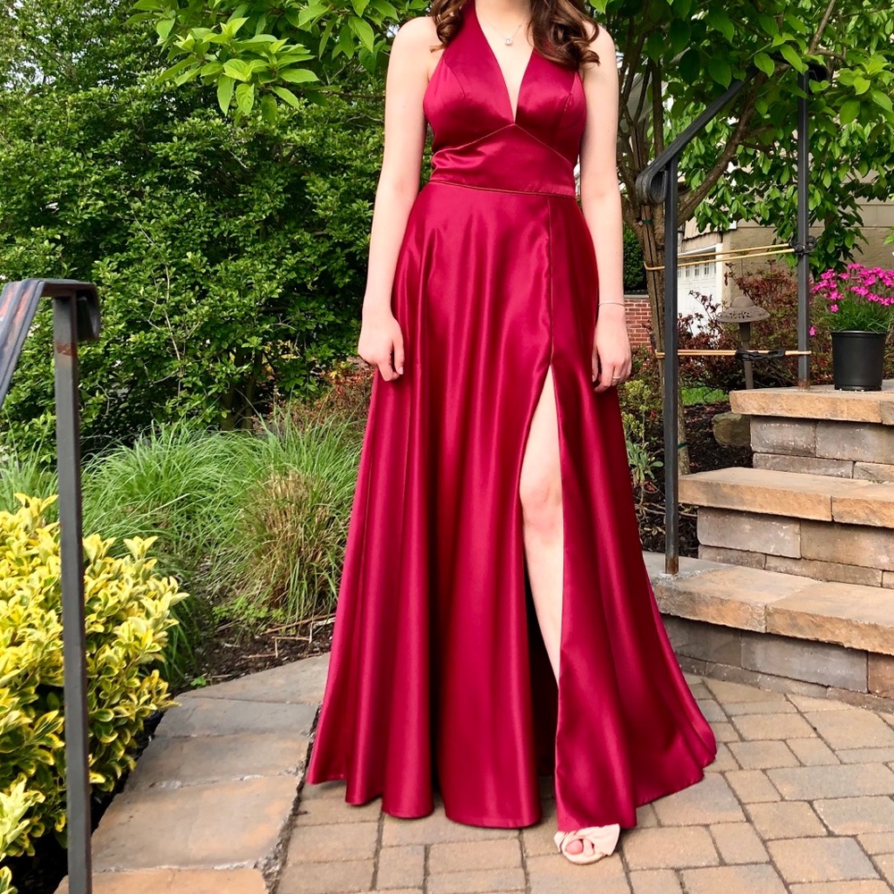 Wine halter prom dress with slit, pockets, and built in cups!